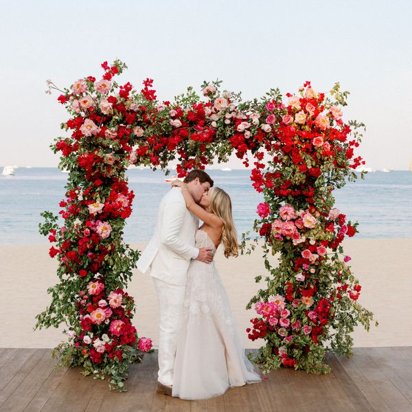 Couple Kisses at Their Ceremony During Their Destination Wedding in Mexico