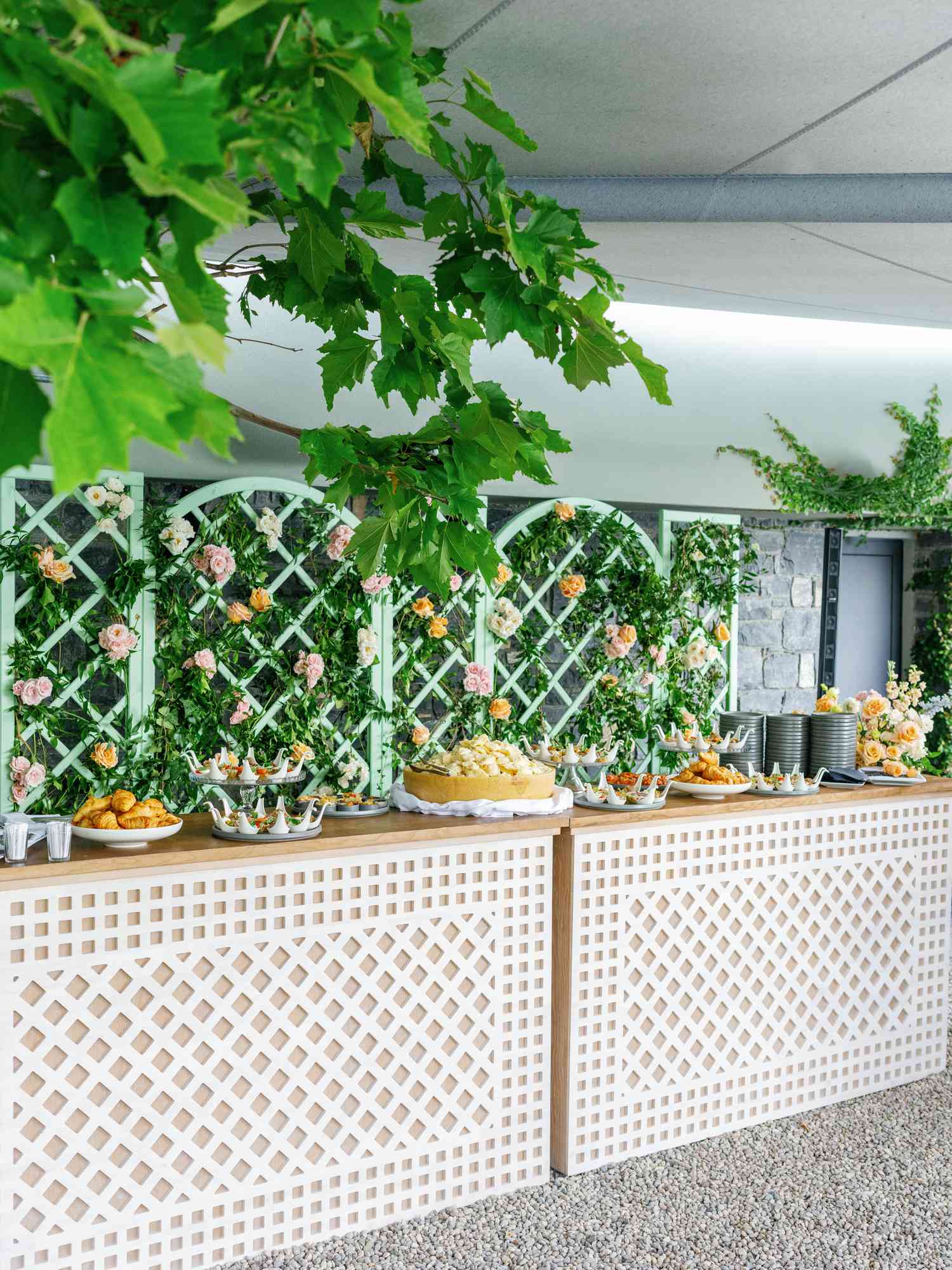 Hors D'oeuvre Table With White Fence and Colorful Flower Decor