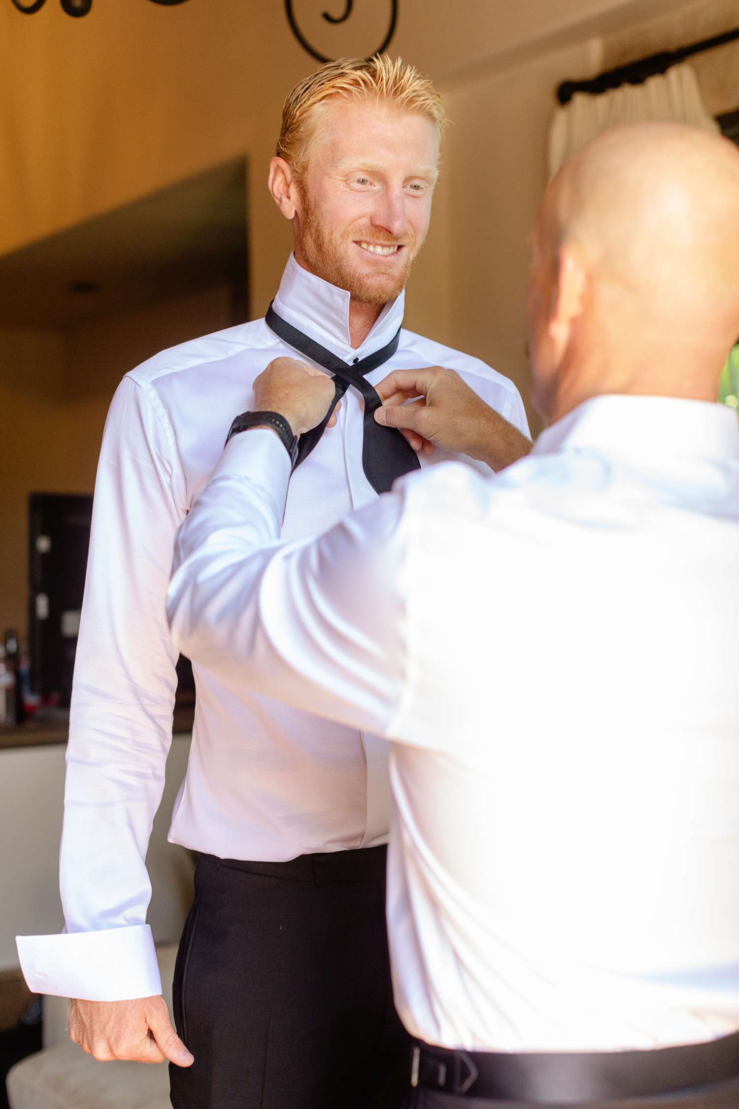 Olympic Volley Ball Player Chase Budinger Having Bow Tie Tied by Man in White Shirt