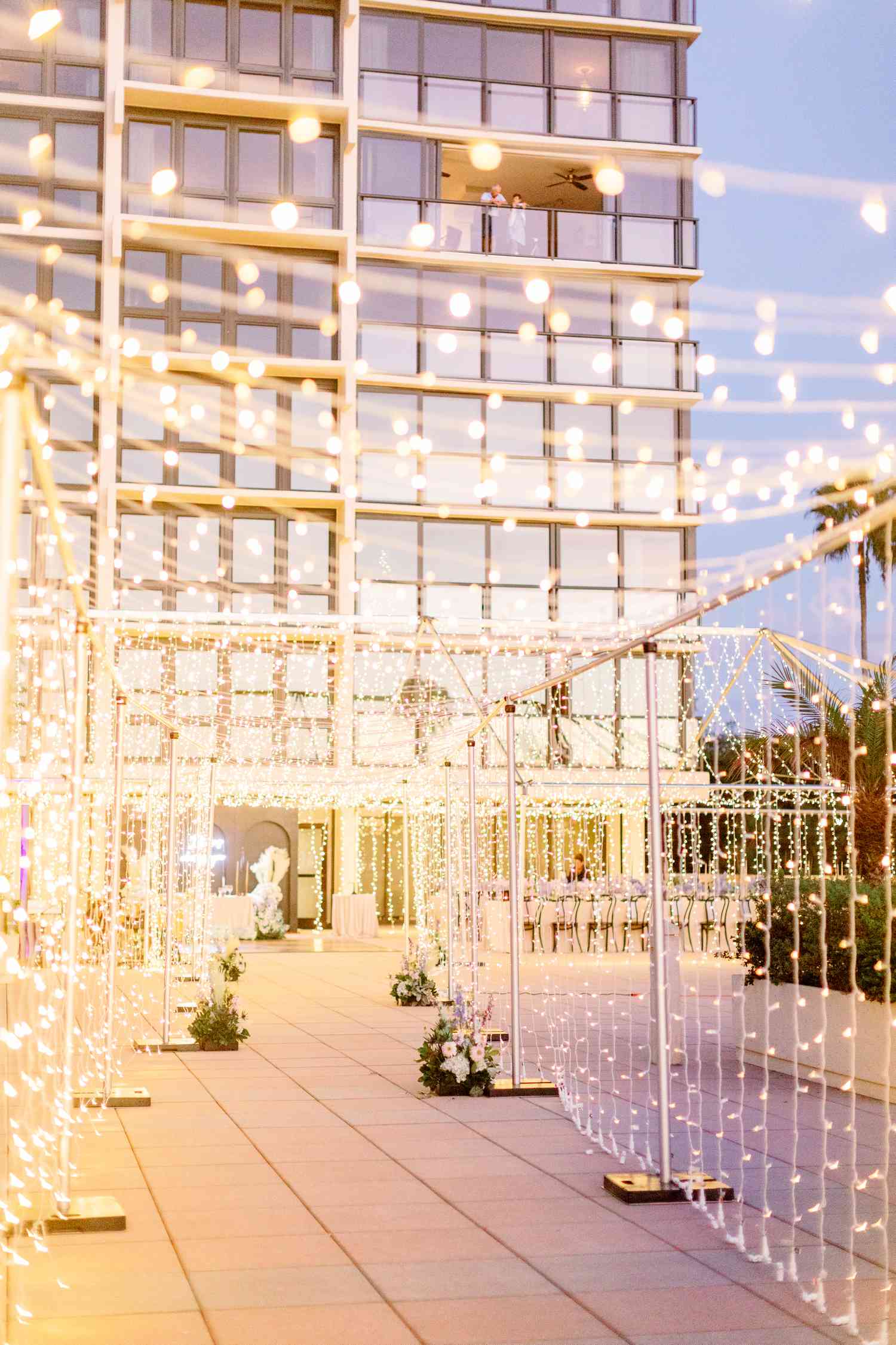 String Light Decor on Tent Frame at Wedding Reception