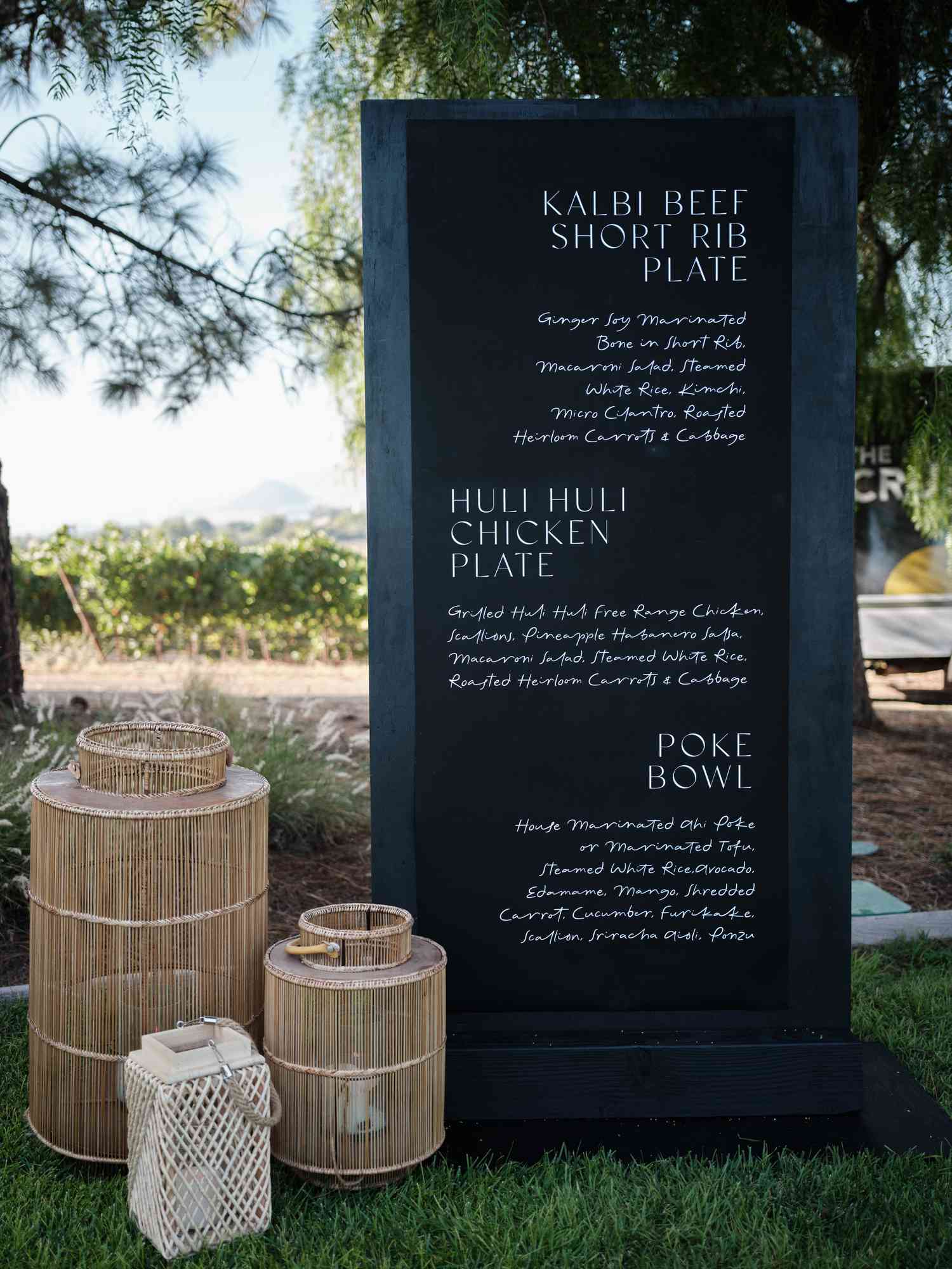Large Menu on Black Board Next to Wooden Lantern Decor