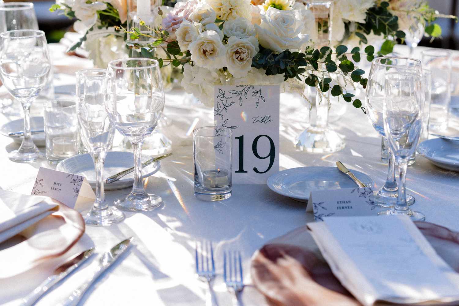 Wedding Reception Table Decor With Glassware and Black and White Table Number