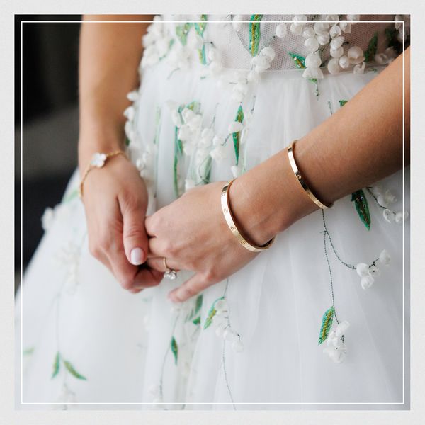 close up shot of a bride's hand and arm to showcase her jewelry