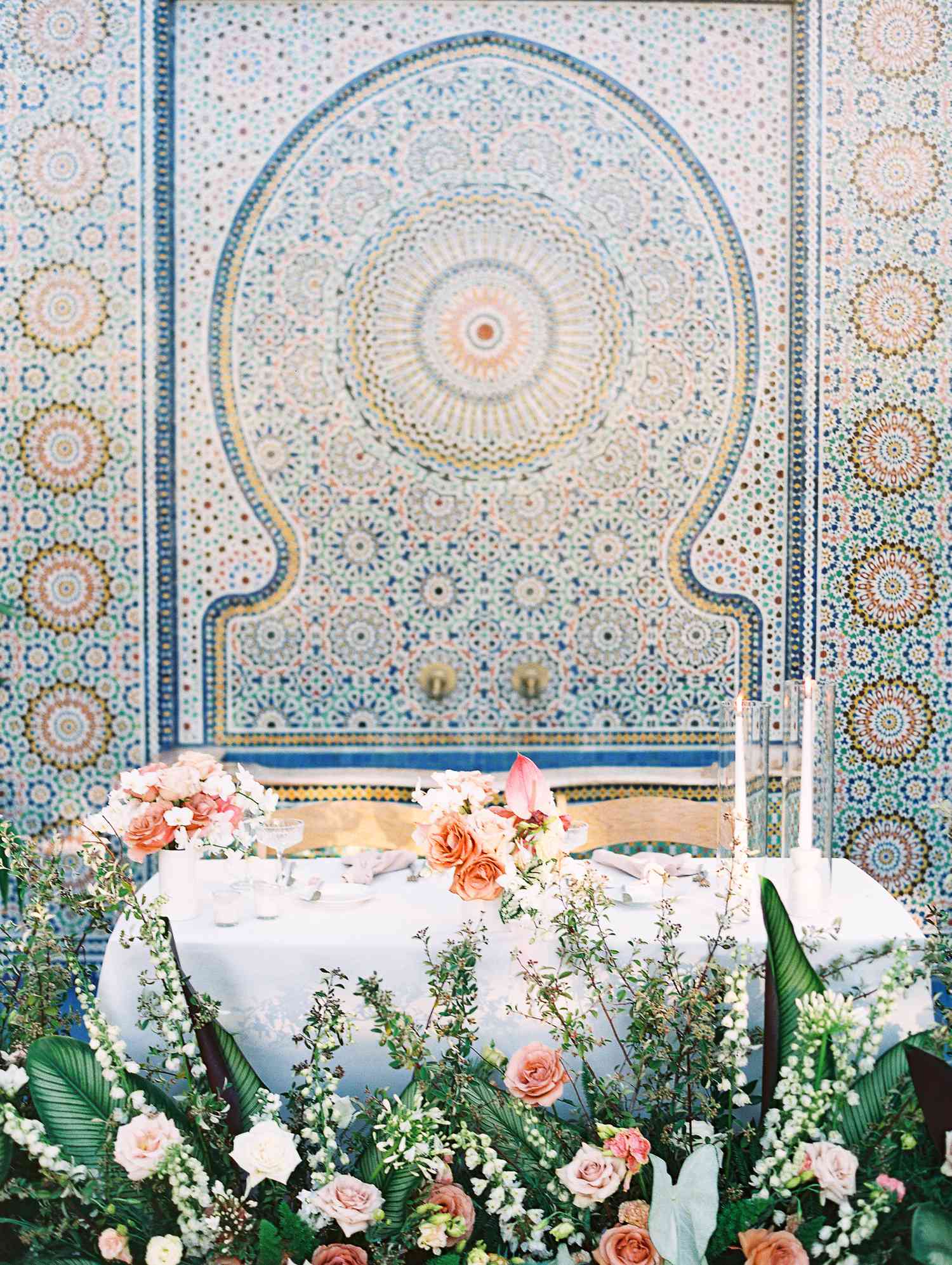Wedding Reception Sweetheart Table with Grounded Floral Installation