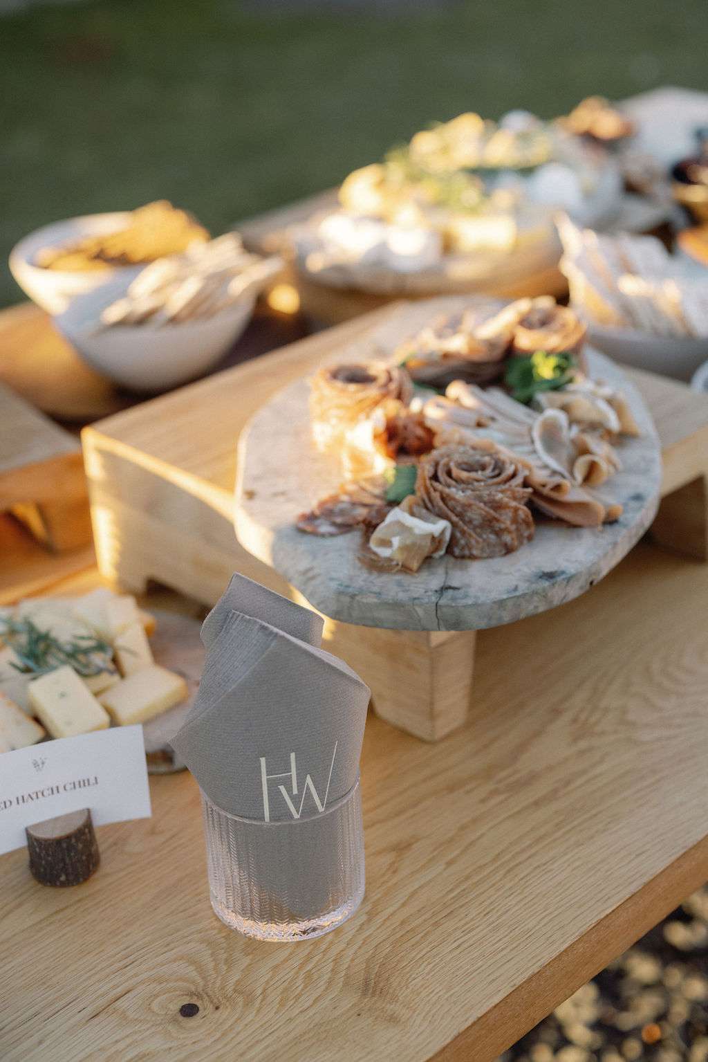 Hors d'oeuvres On Wooden Table With Custom Gray Napkins at Wedding