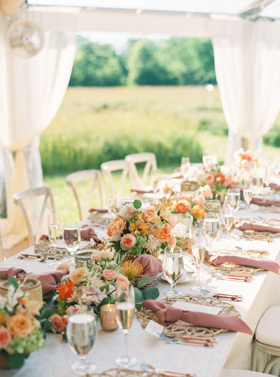 Long Wedding Reception Tables with Pastel Floral Centerpieces