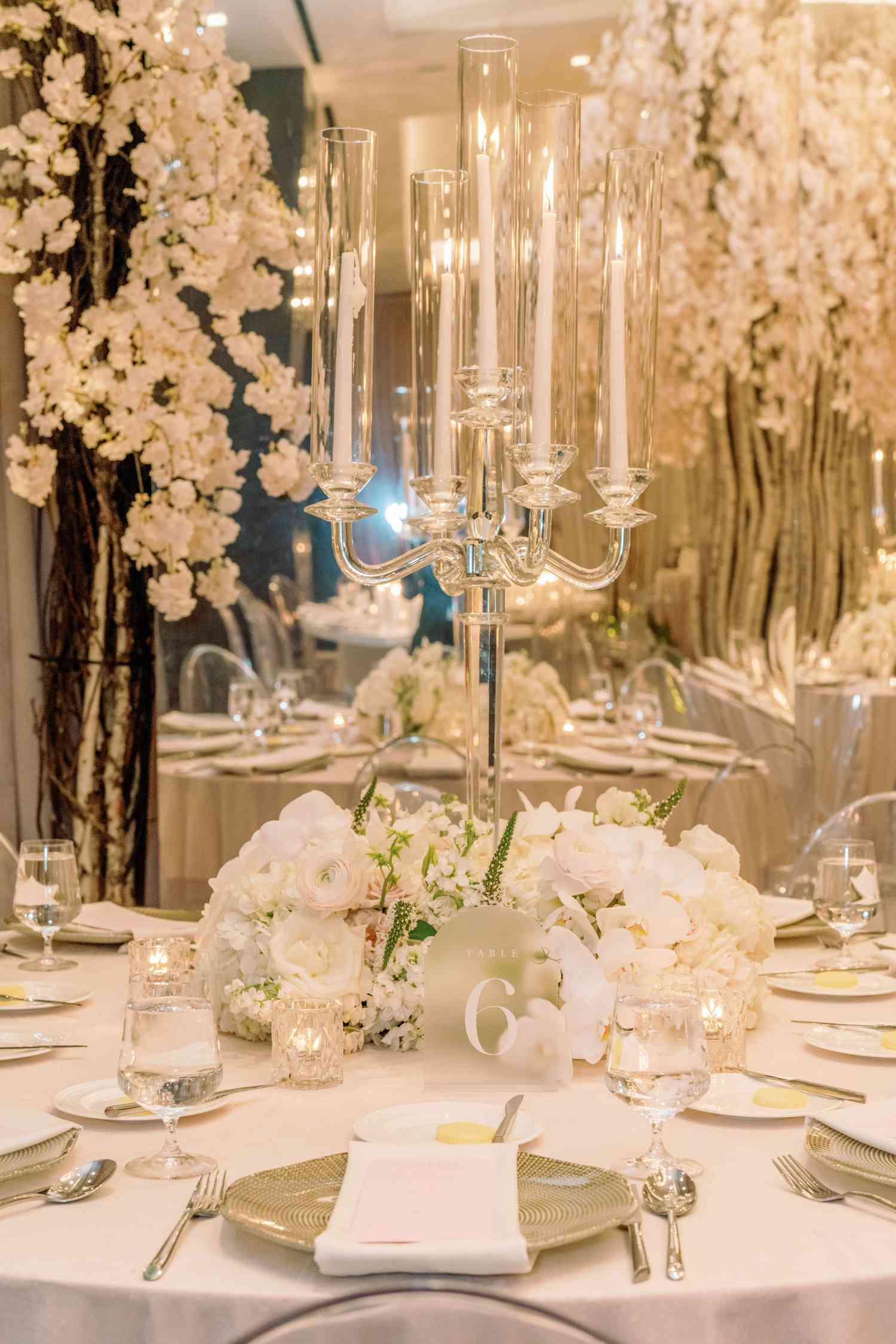 dinner table with glass candle as the center piece