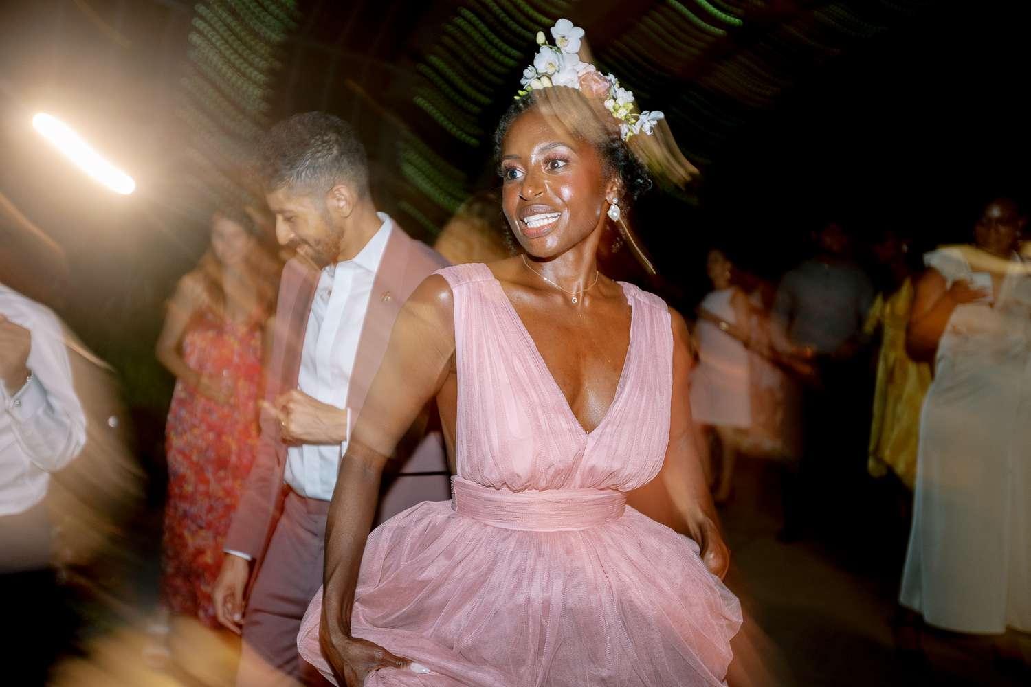 Bride in V-Neck Pink Gown Dancing During Wedding Reception