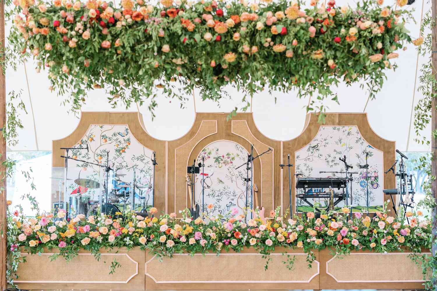 Colorful Flower Decor On and Above Stage at Wedding Reception