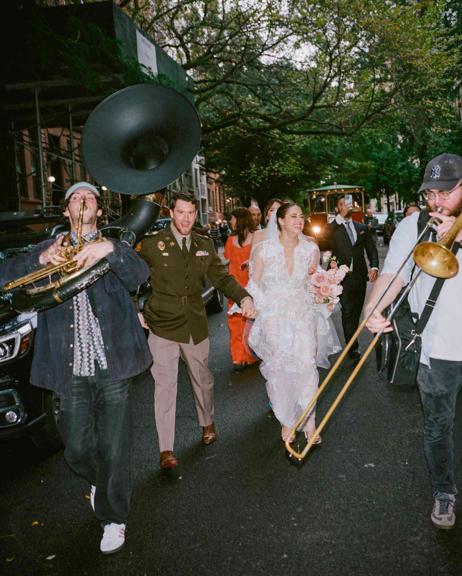 Couple Parades Down the New York City Street As Their Wedding Entrance Following Their Ceremony