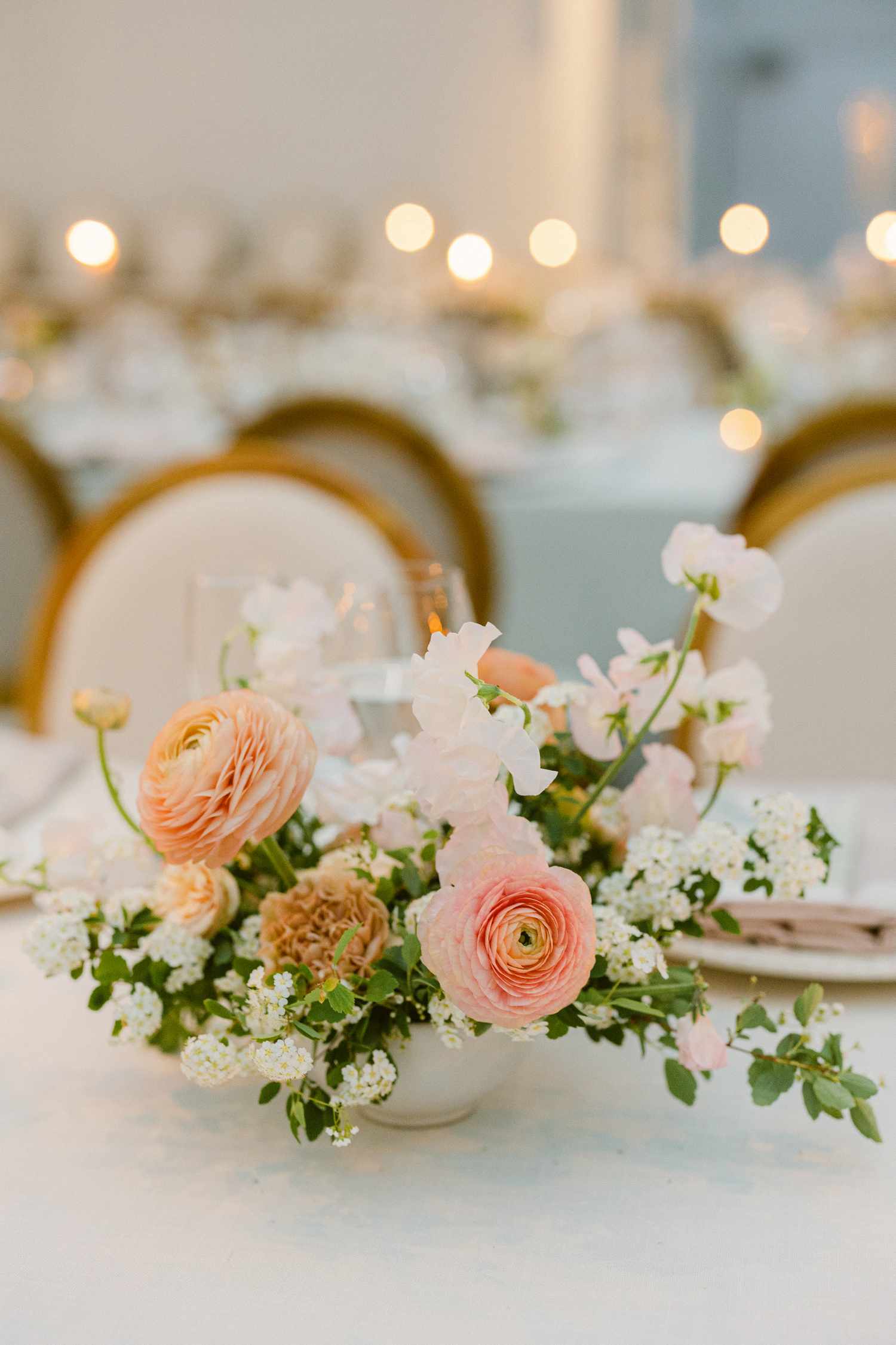 Small Pink and White Floral Wedding Centerpiece With Ranunculus, Sweet Peas, and Spirea