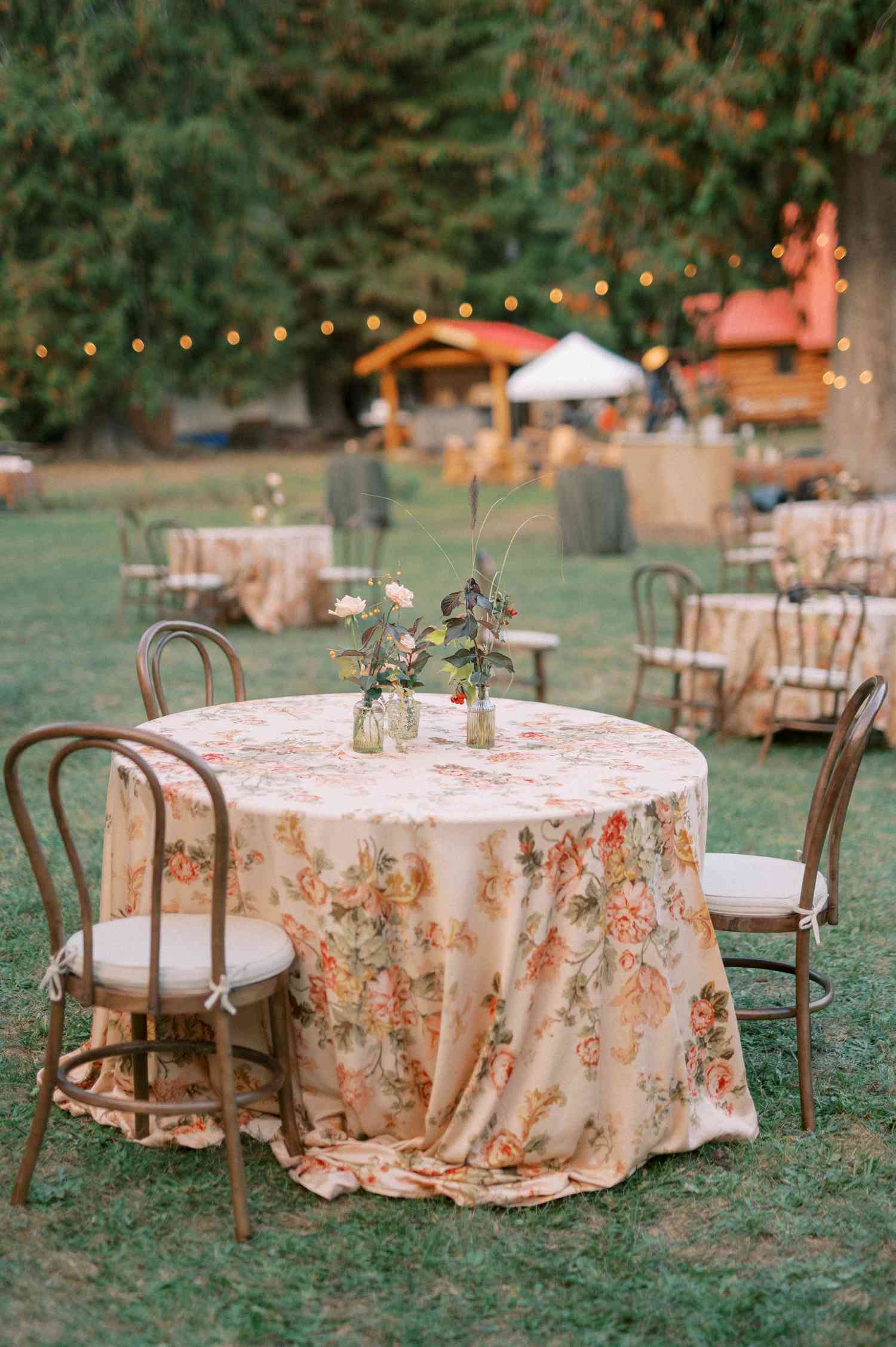 Flower Table Cover With Flower Decor On Round Cocktail Hour Table