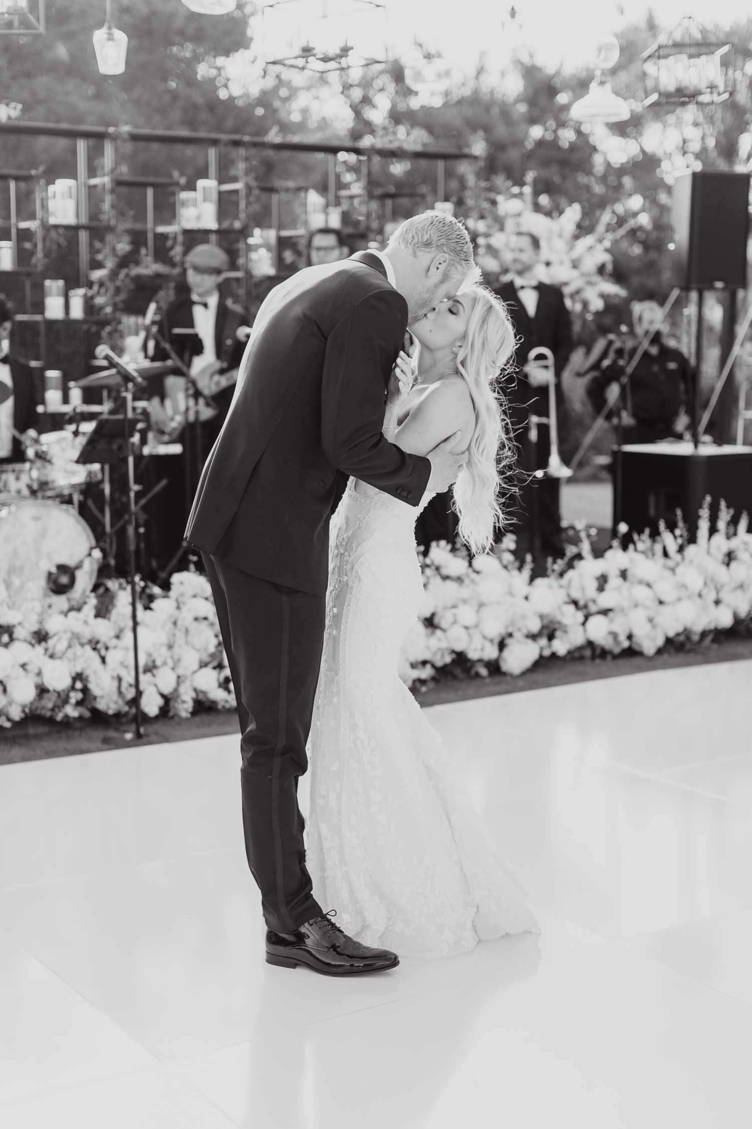 Olympic Volley Ball Player Chase Budinger and Wife Share First Dance in Front of Band at Wedding