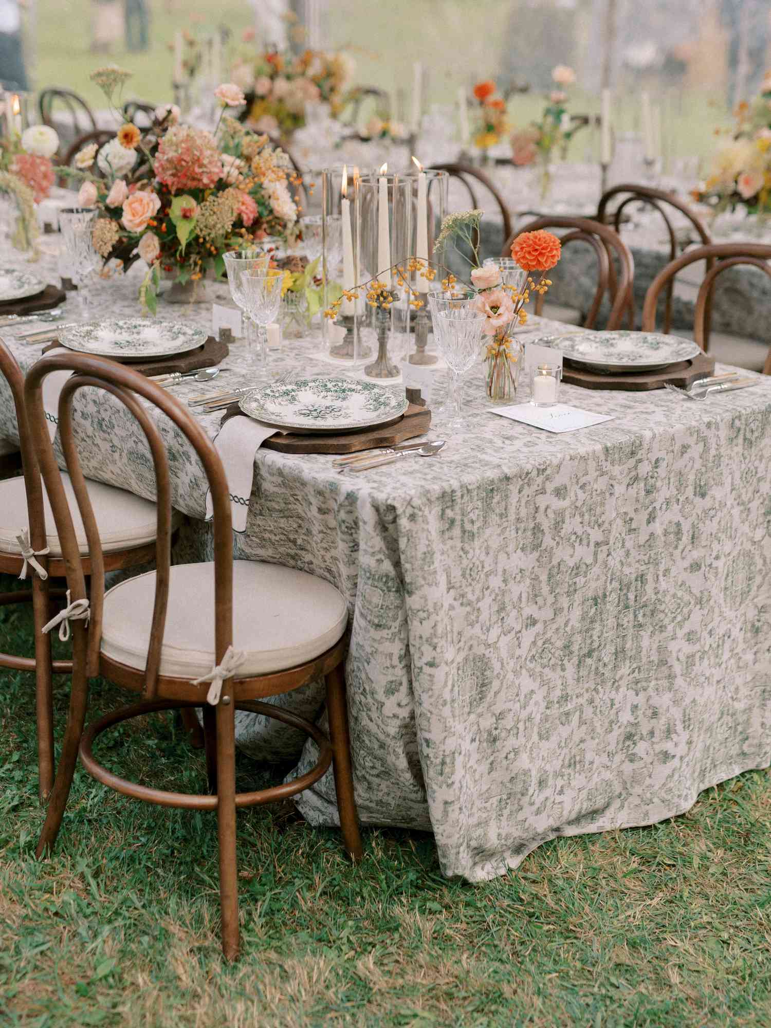 Green Floral Table Cloth and Table Setting on Reception Tables With Colorful Flower Decor