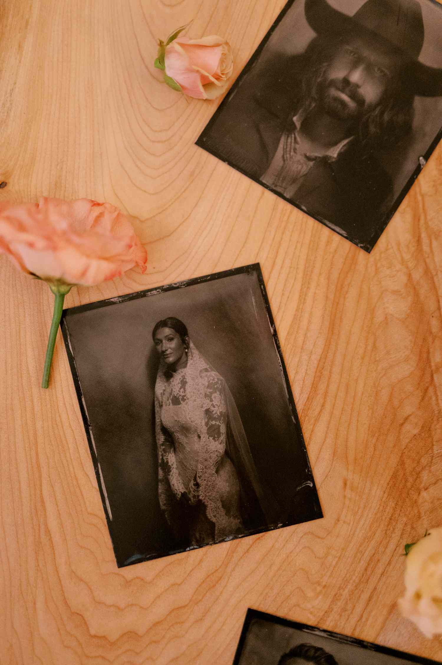 Black and White Film Photographs of Bride and Next to Pink Rose