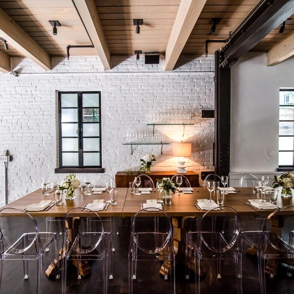 dinner table setting with acrylic chairs