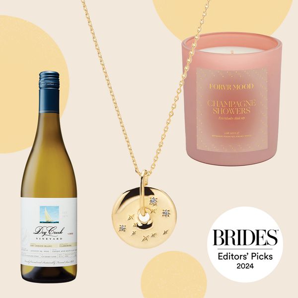 Collage of Wine Bottle, Zodiac Necklace, and Pink Candle
