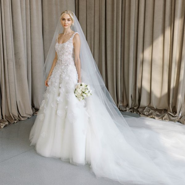 bride wearing an embellished A-line wedding dress