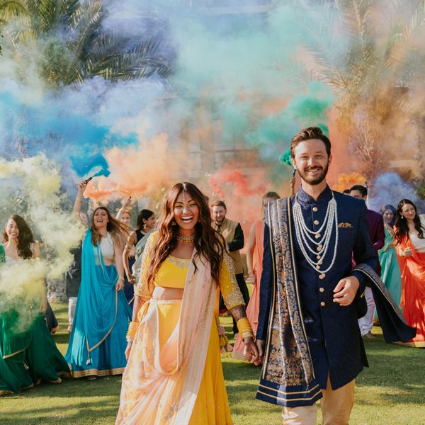 couple in front of smoke bombs