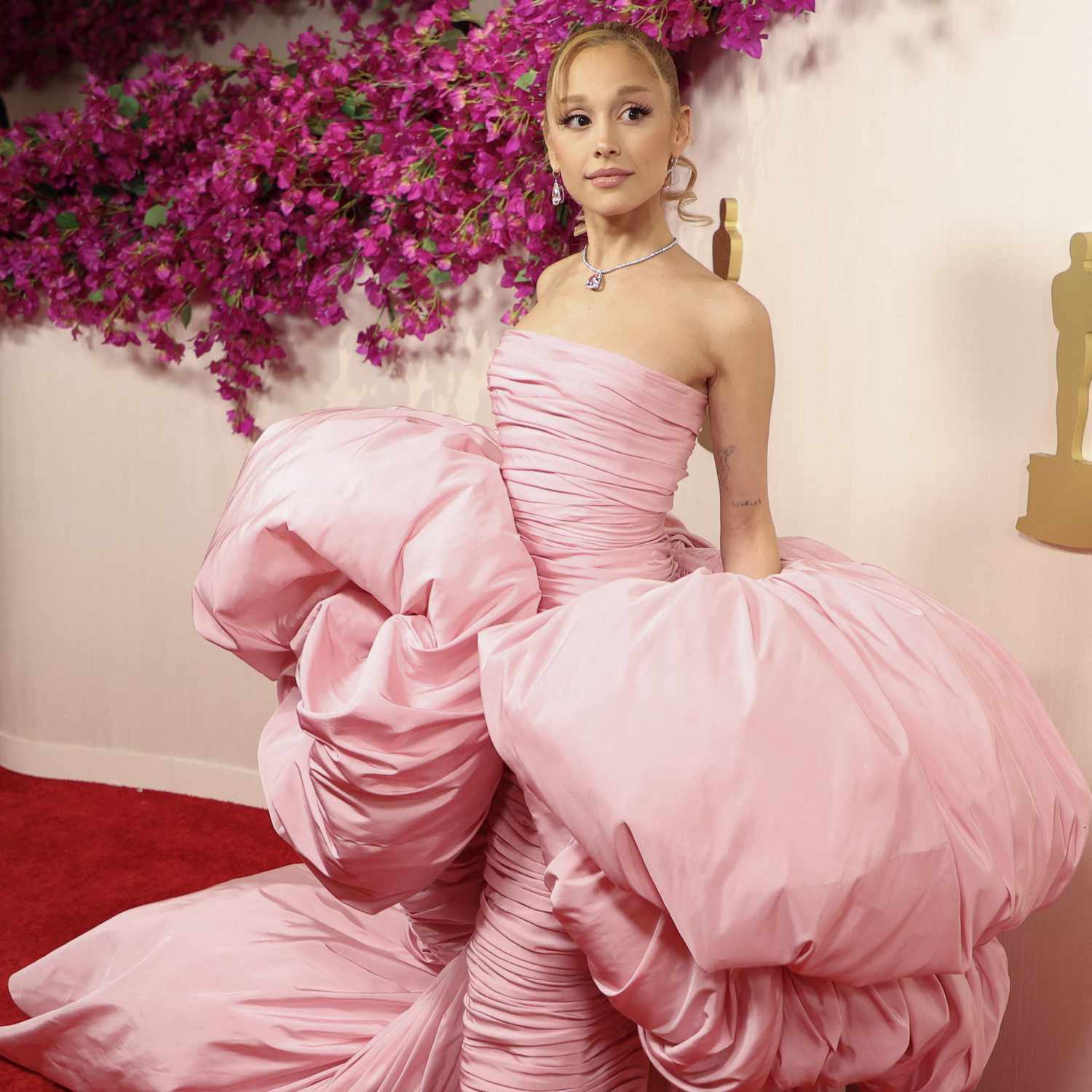 Ariana Grande Wearing Strapless Pink Dress With Voluminous Skirt on Red Carpet