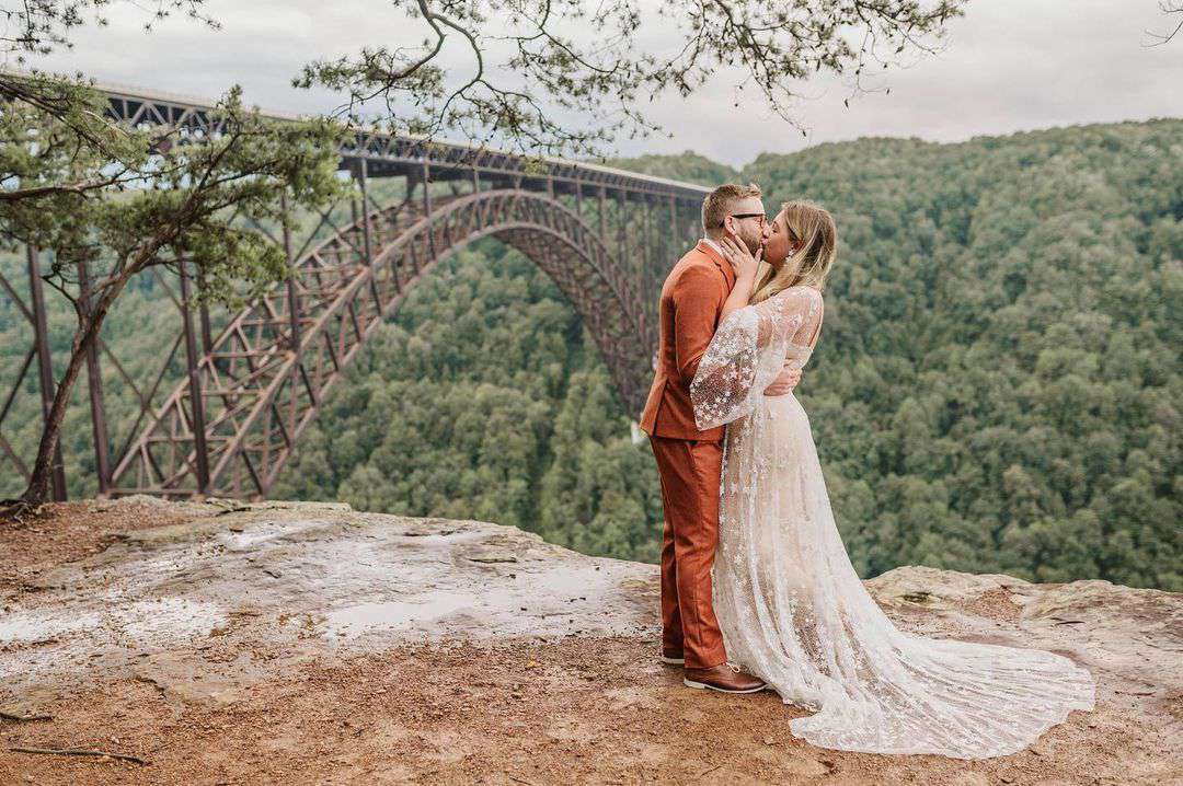 Couple Shares a Kiss During Their Elopement at New River Gorge in West Virginia