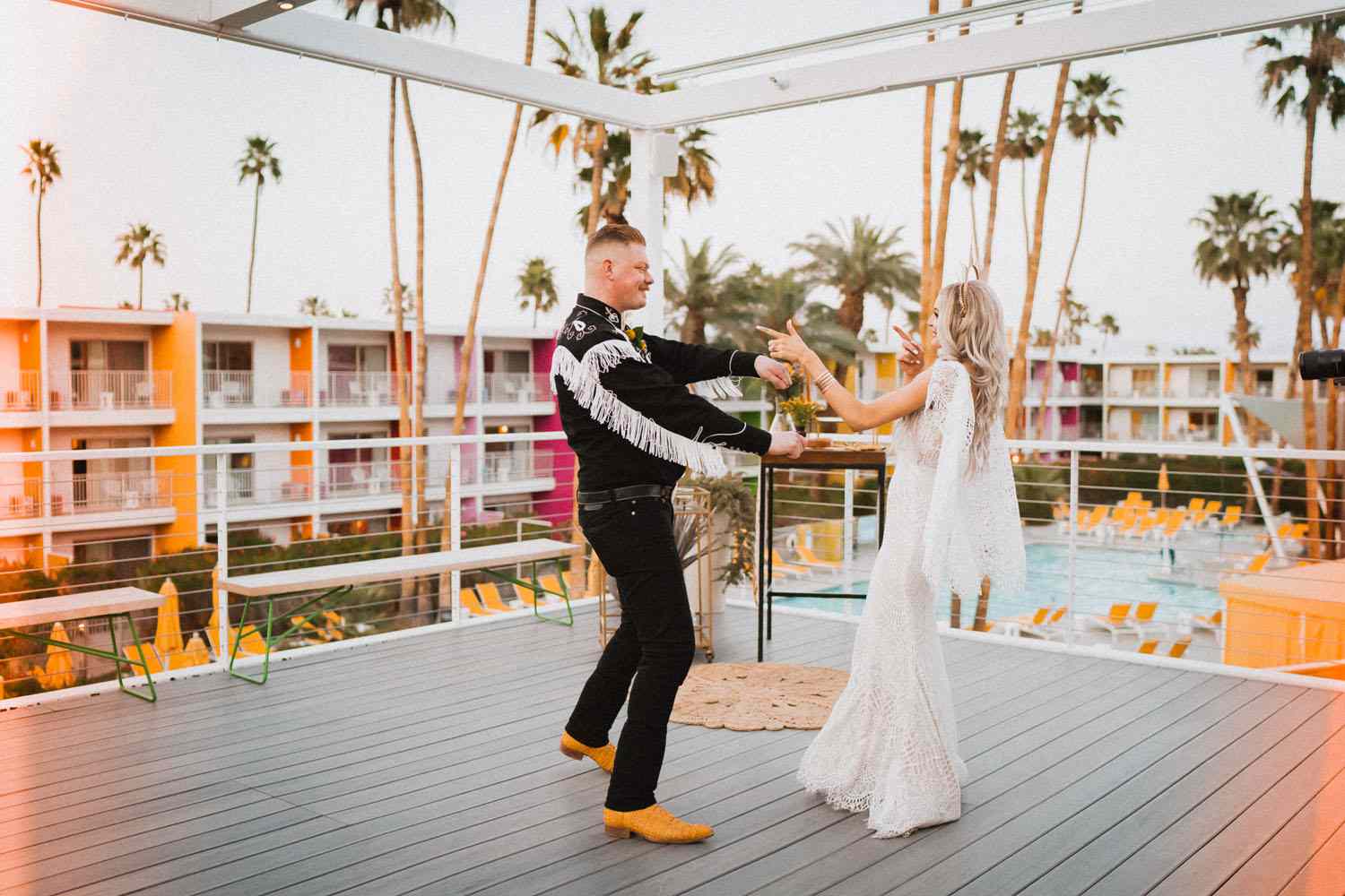 Bride and Groom Dance Together in Palm Springs During Their Destination Elopement