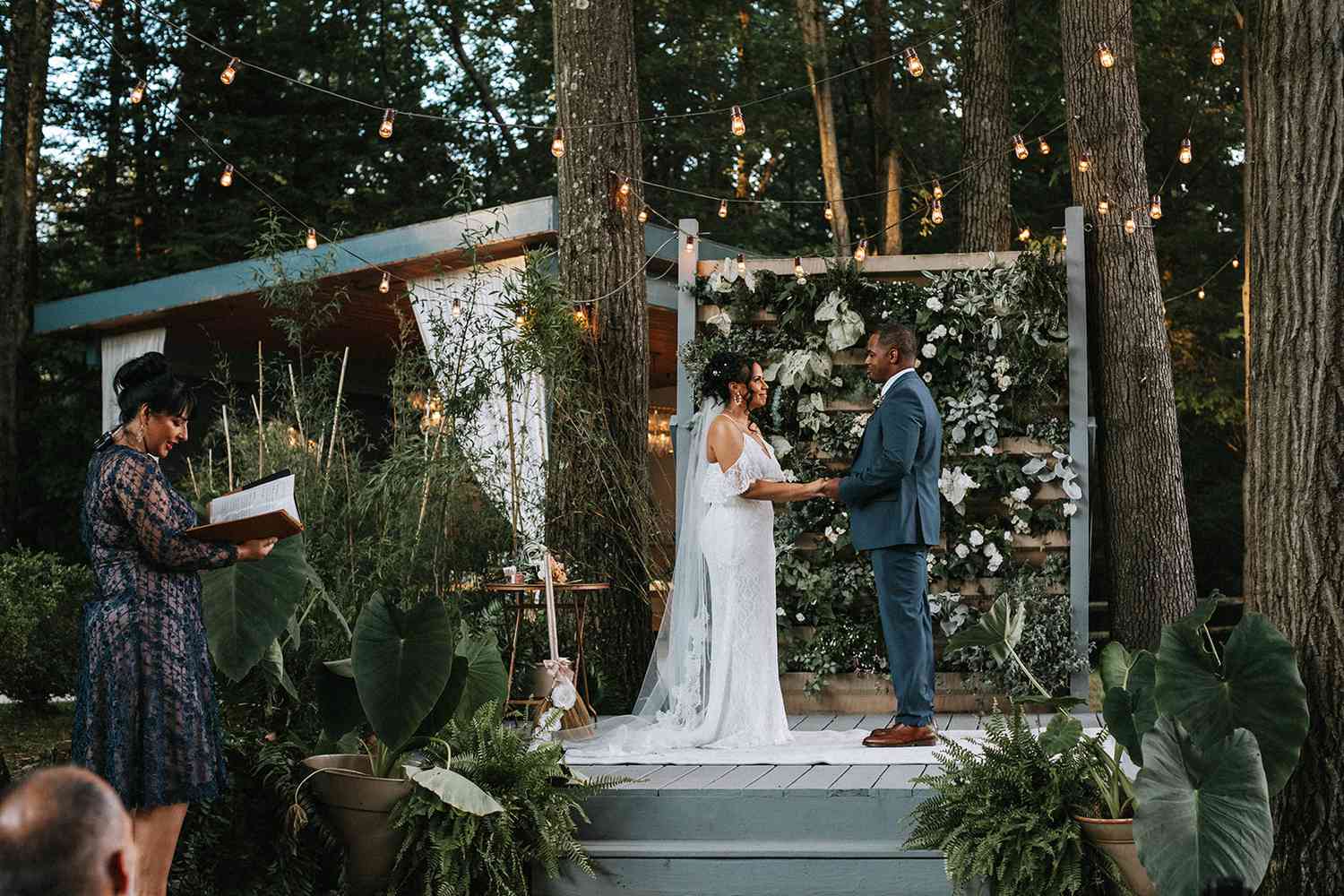 Bride and Groom Exchanges Vows in The Poconos With Officiant During Their Elopement