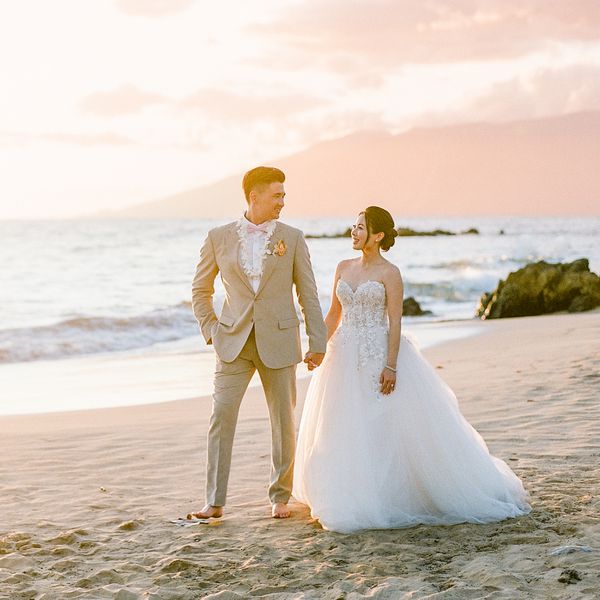 bride and groom on a beach in hawaii