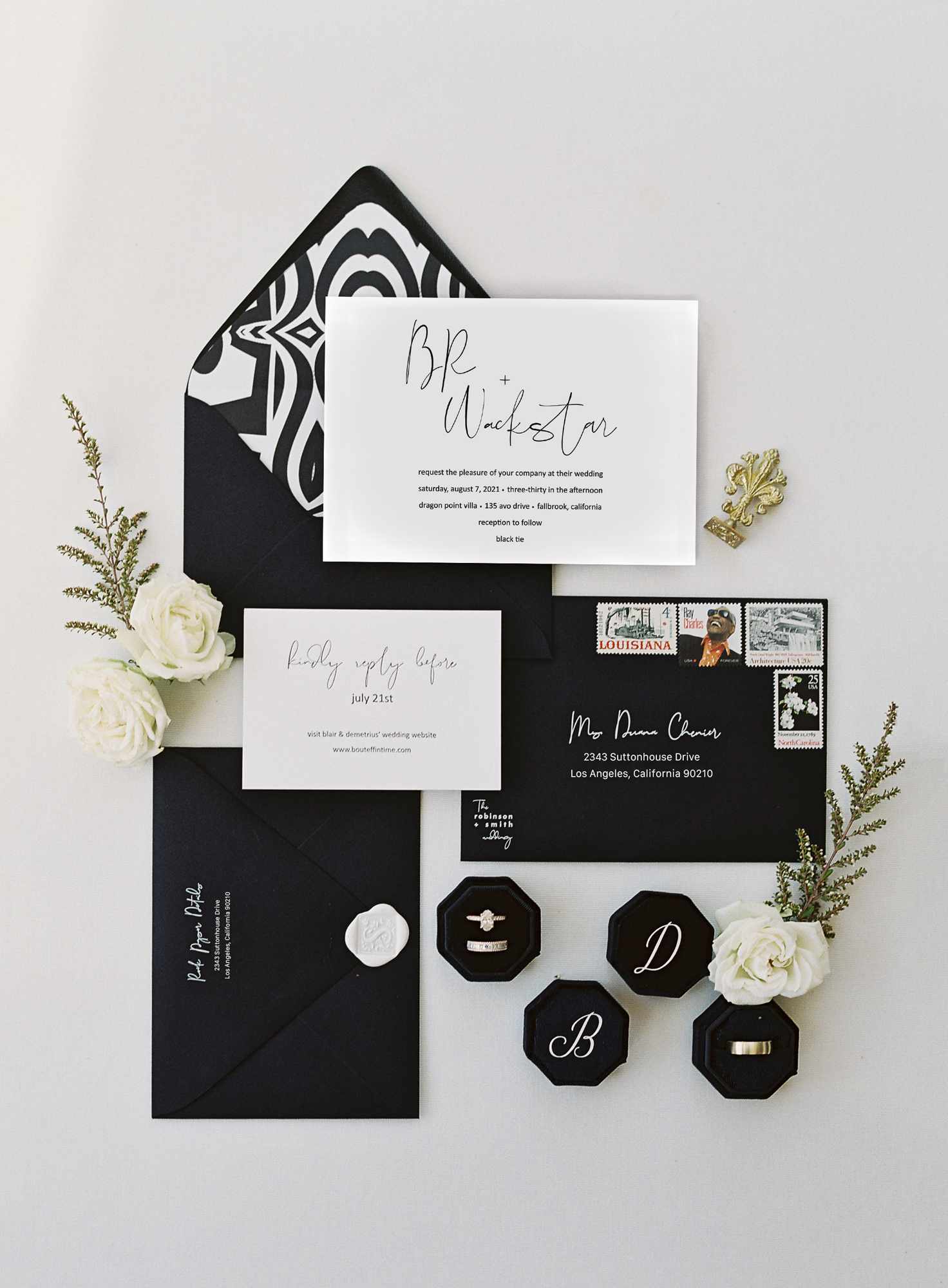 Black and white invitation suite with custom seal