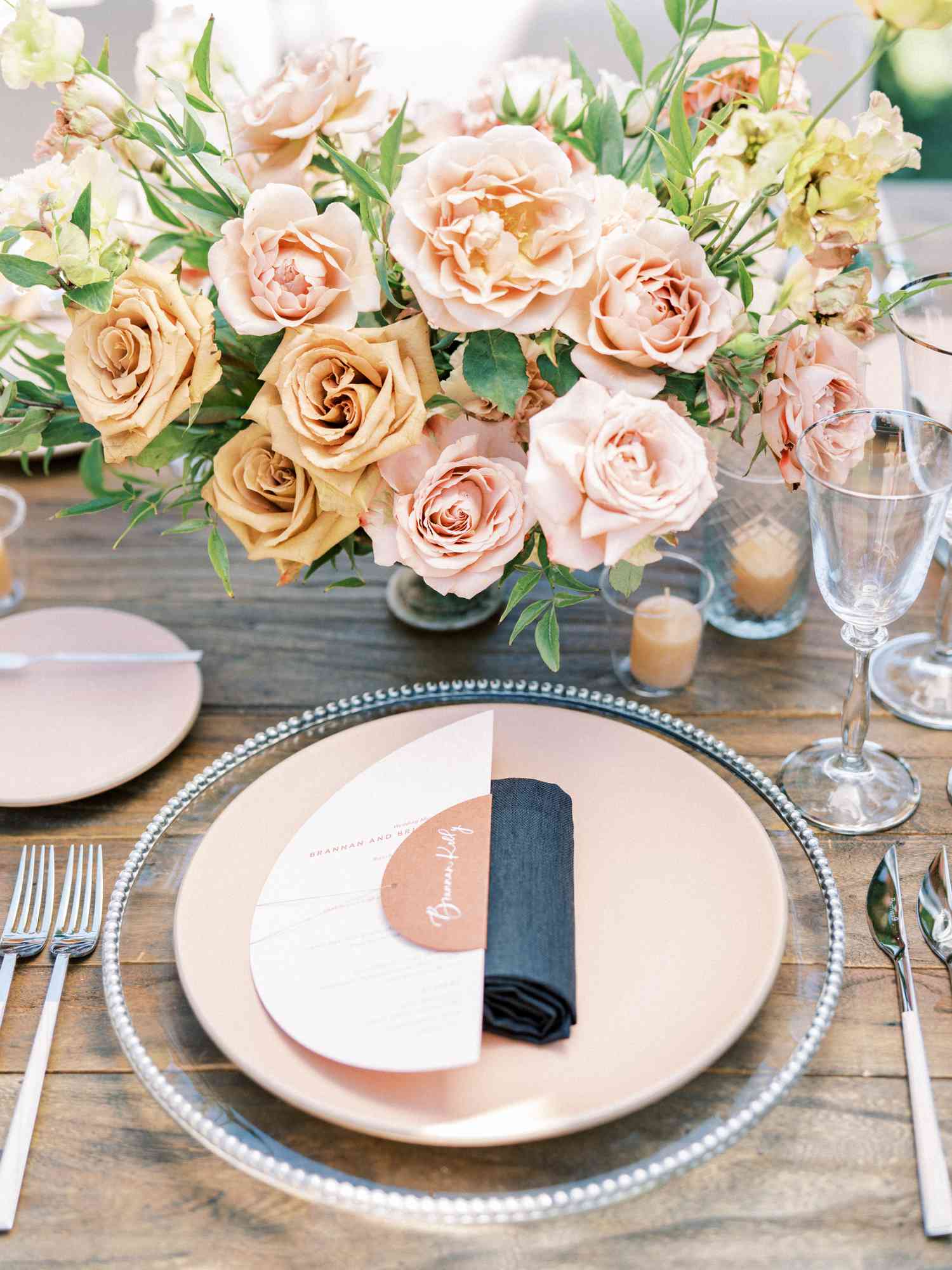Wedding Reception Tables With Blush Centerpieces of Roses and Greenery