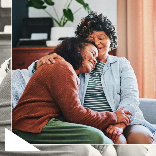 Adult Woman Hugging Her Mother on Couch