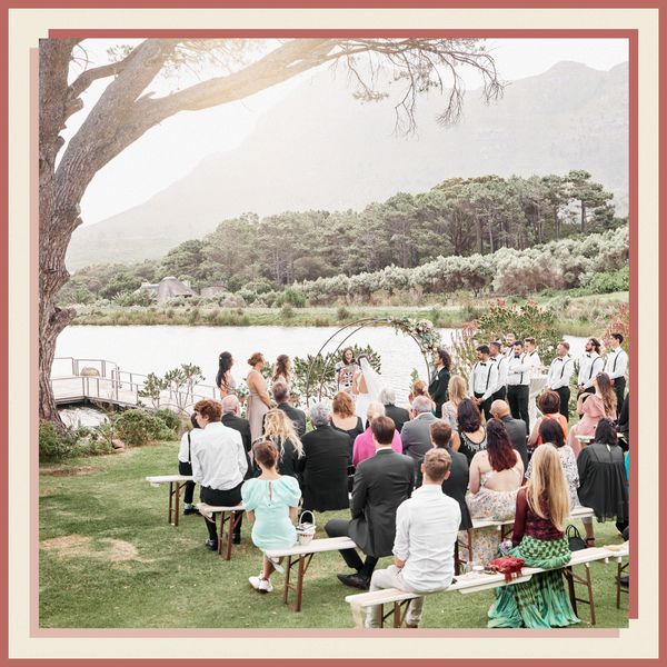 Wedding Ceremony With Guests in Front of Lake