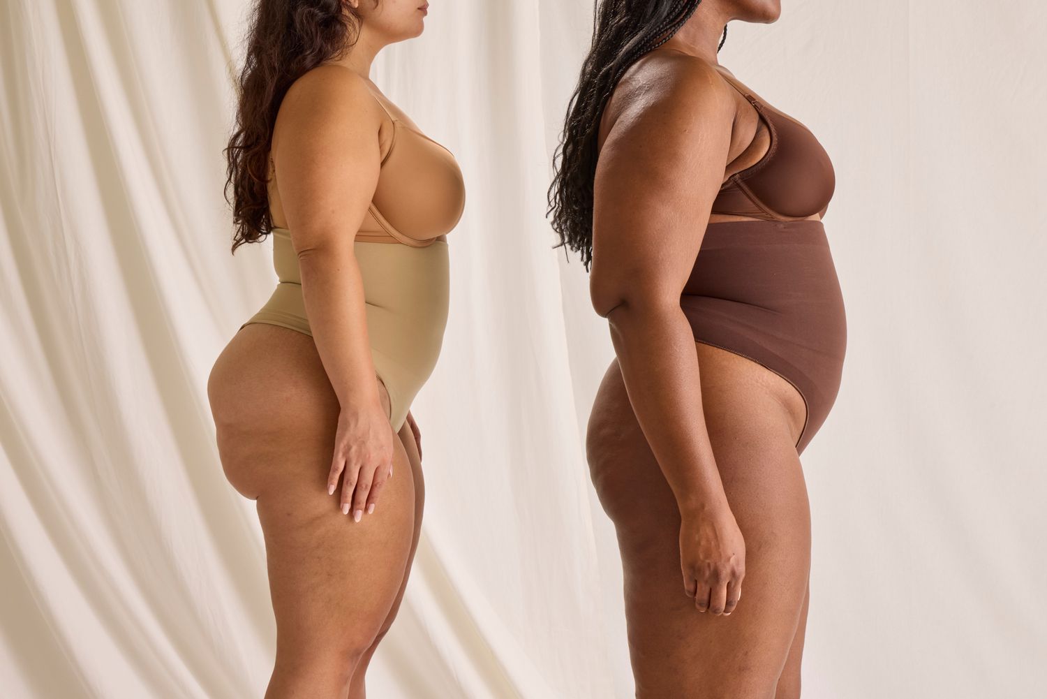 The side profiles of two women wearing the SKIMS Core Control Thong