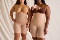 Two women wearing the SPANXsculpt TotalContour High-Waisted Mid-Thigh Short