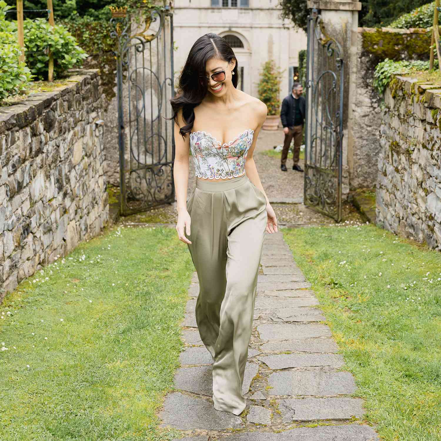 woman walking down a path