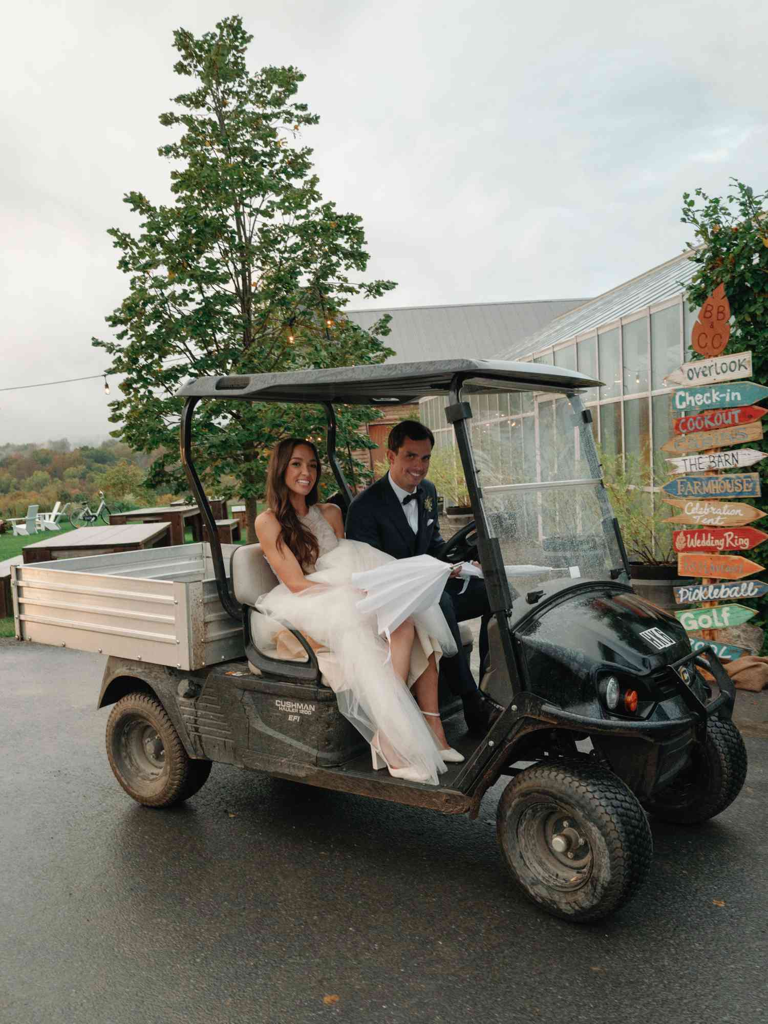 Couple Travels to Their Wedding Reception Space in a Golf Cart for Their Wedding Entrance