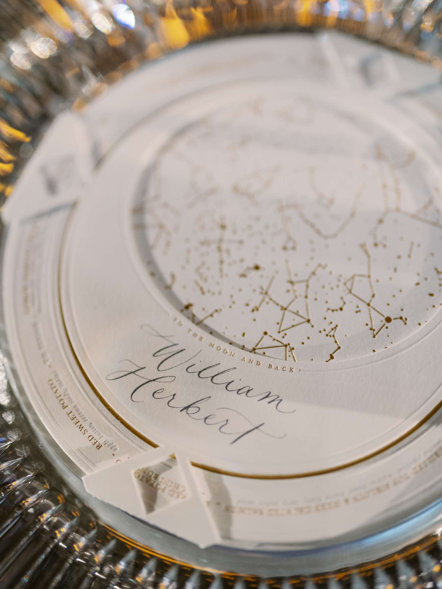 A custom star chart menu embossed in gold