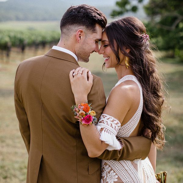 bride and groom smiling into each other's eyes