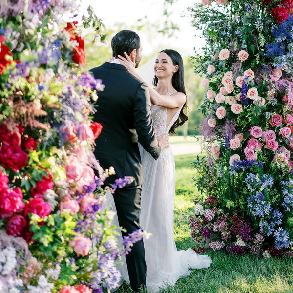 Bride Puts Her Hands on Groom's Face During Wedding Ceremony