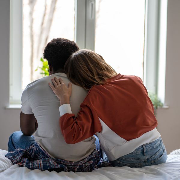 Couple Comforting Each Other While Discussing the Signs of Commitment Issues
