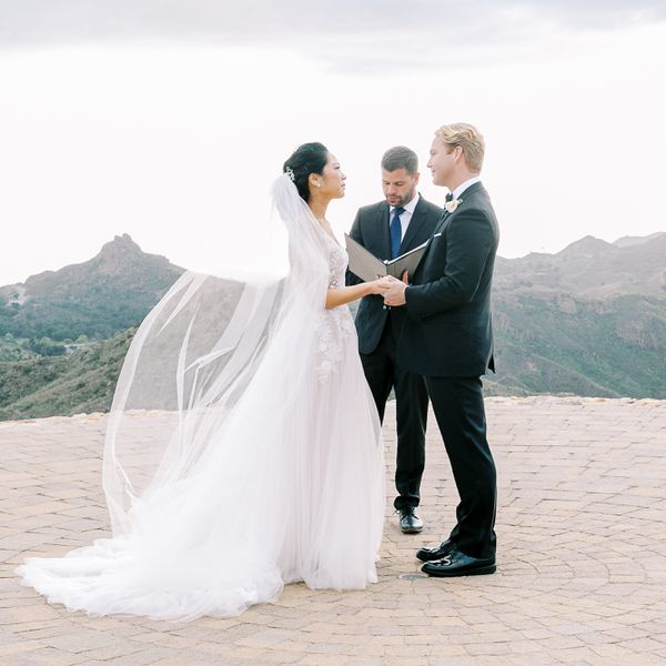 bride and groom exchanging wedding vows