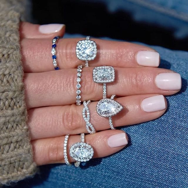 A hand with engagement rings