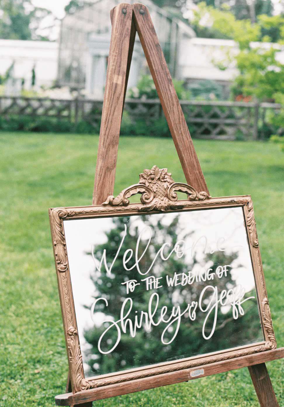 vintage wedding Mirror sign on rustic wooden easel