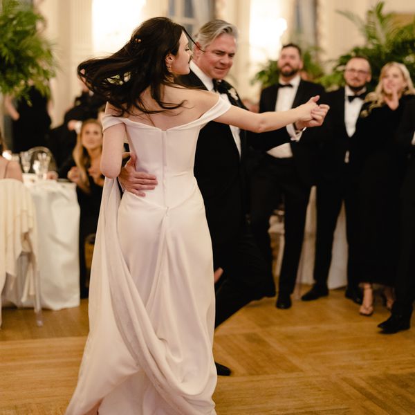 Bride in Off-the-Shoulder Wedding Dress Sharing Father-Daughter Dance With Dad in Black Tuxedo