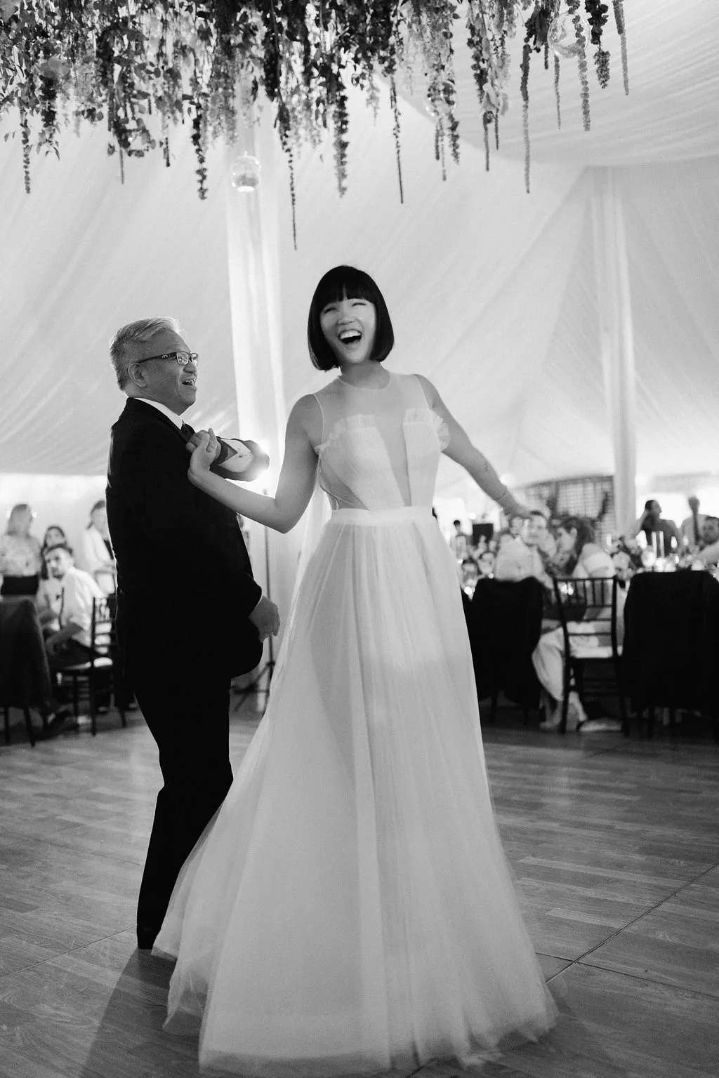 Bride dancing with father at her wedding