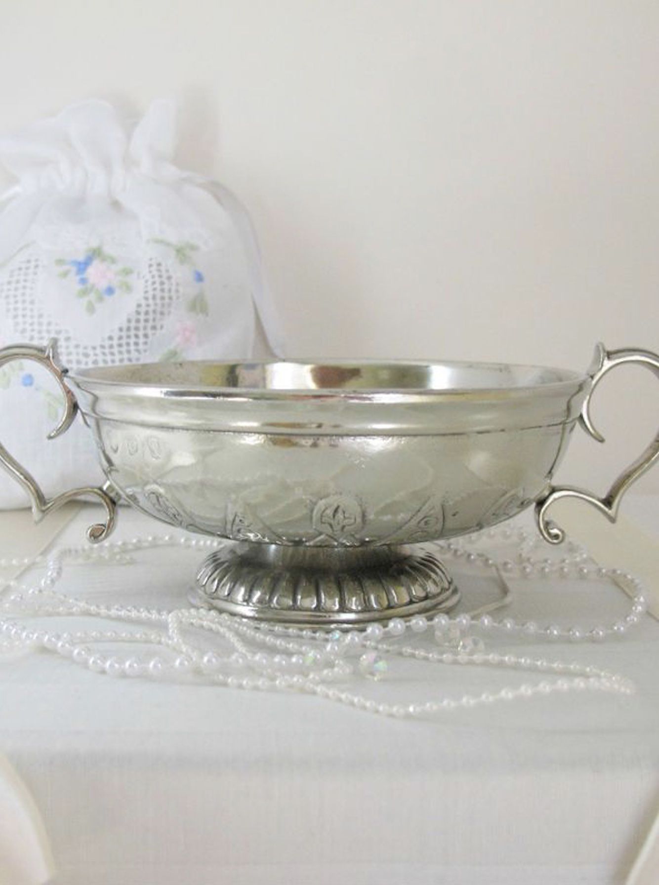 Shallow silver two-handled cup