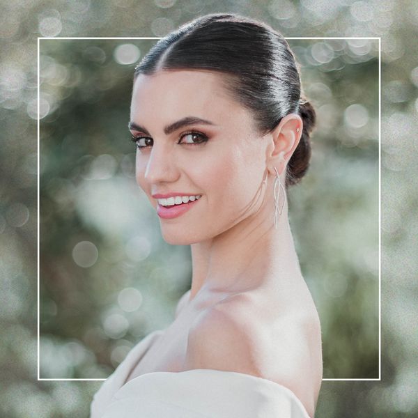 Hayley Erbert Photo with Sleek Low Bun and Off-the-Shoulder Wedding Dress