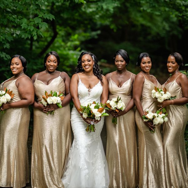 Bridesmaids in Sparkly Gold Dresses, Holding Bouquets and Posing With Bride