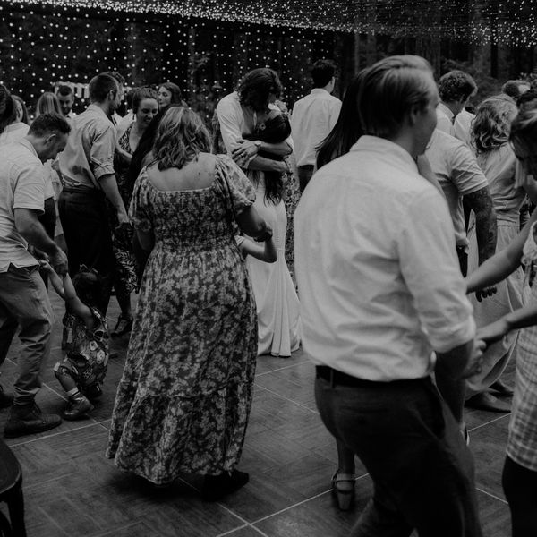 guests on dance floor at wedding