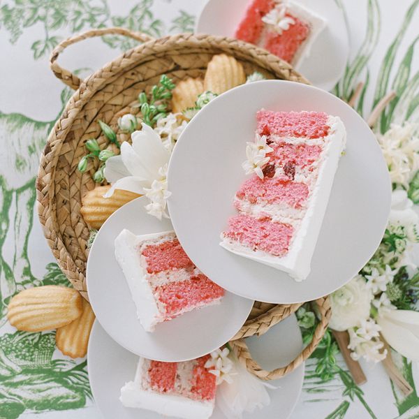 pink wedding cake slices with buttercream frosting